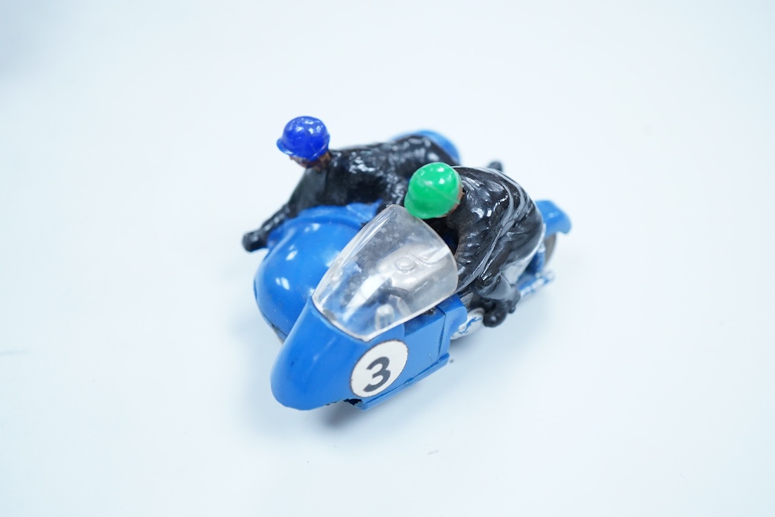 A boxed Tri-ang Scalextric T. C. Seat 600 (C-31) in red, with correct red spot box, together with an unboxed Hurricane combination motorcycle and sidecar MM/82